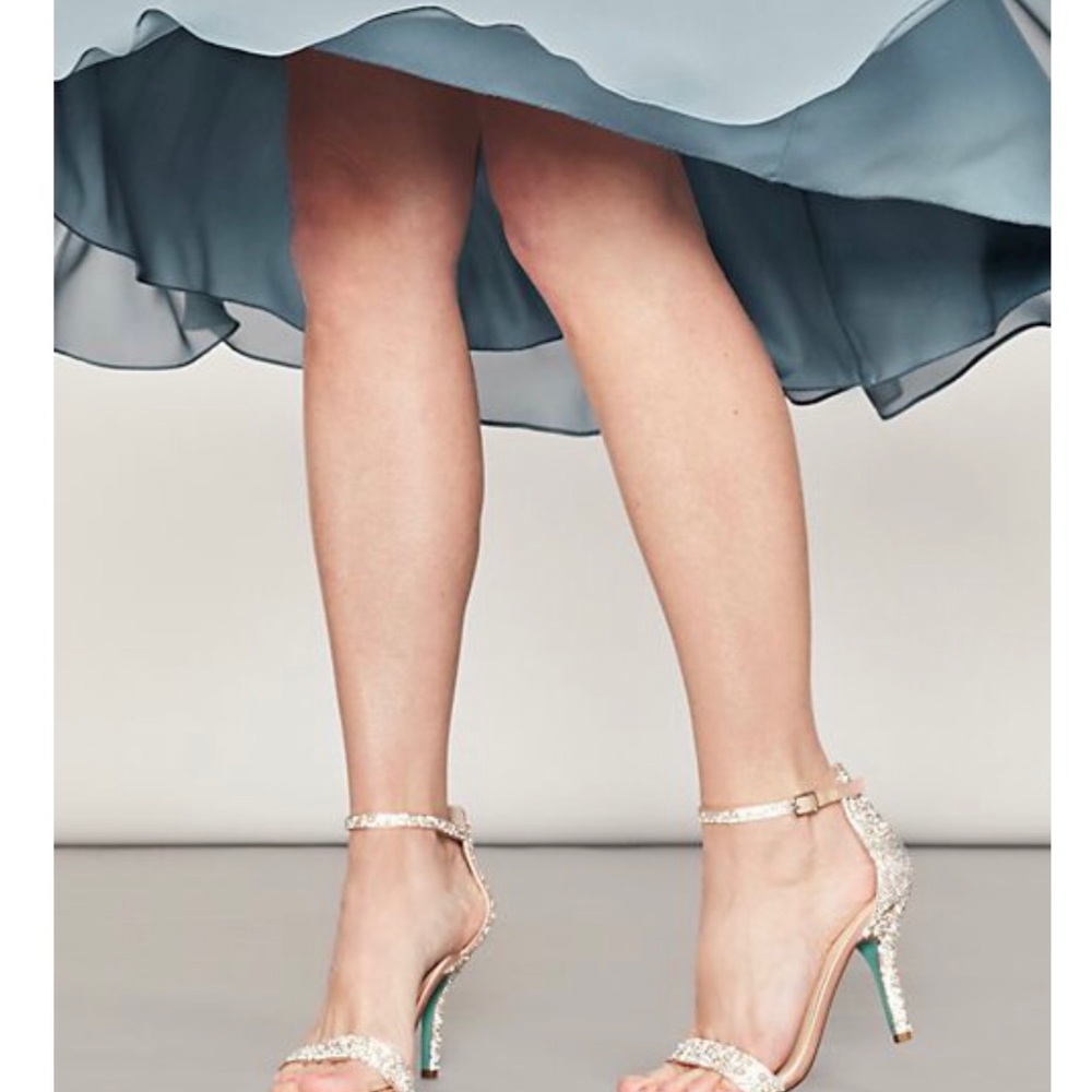 BETSEY JOHNSON X DB

jeweled metallic stiletto sandals size 8.5 Ivory